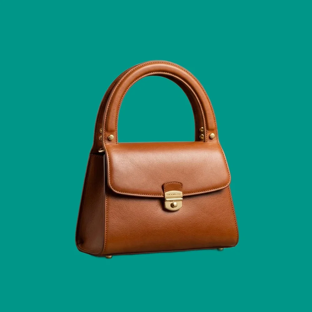 Brown leather handbag — After